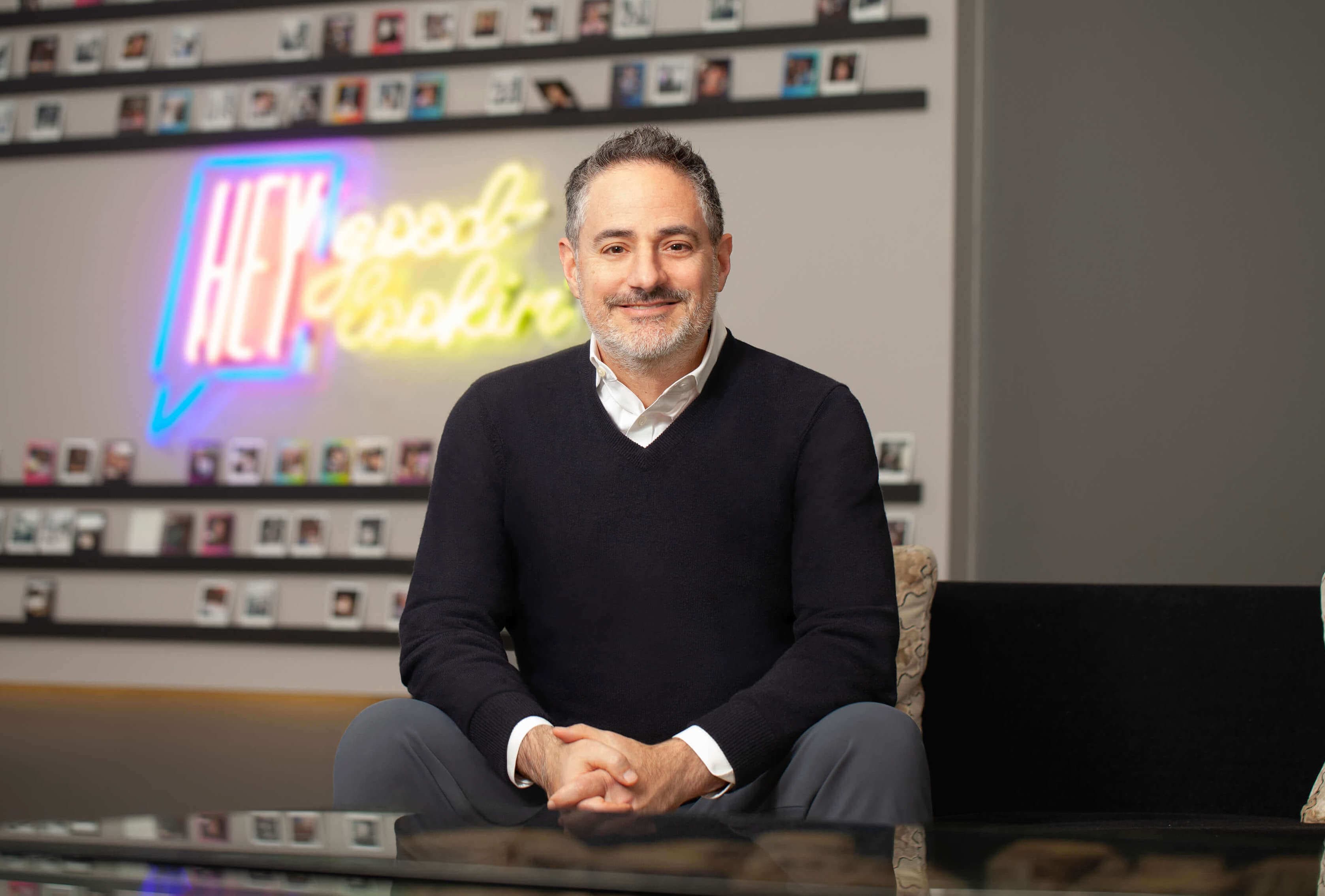 Headshot of Chris sitting in a Weber Shandwick office