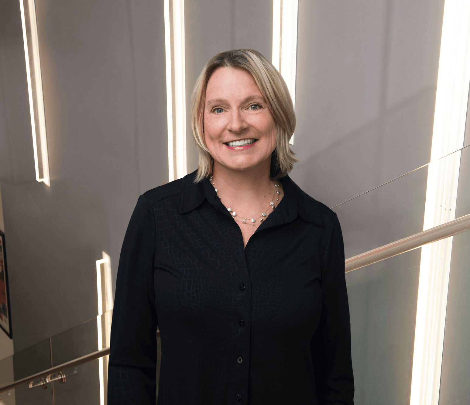 Headshot of Pam in a Weber Shandwick office