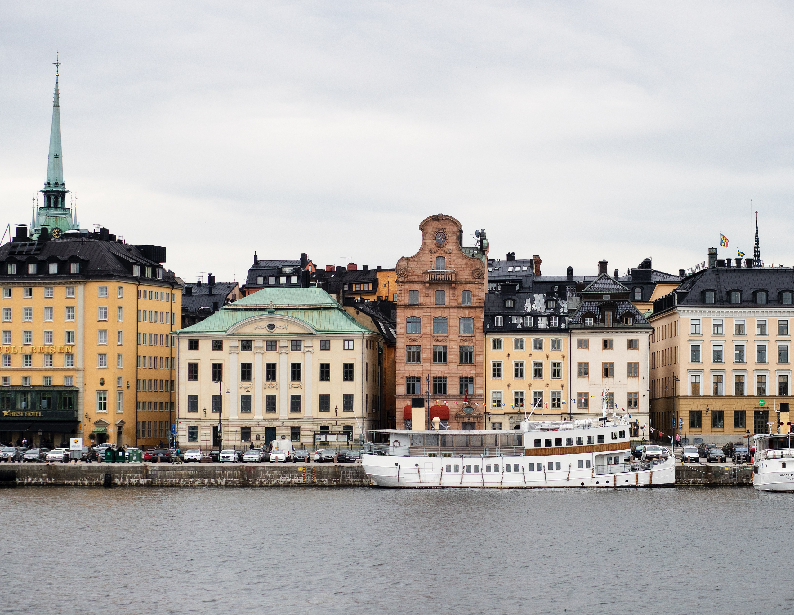 View from across the water of several buildings in downtown Stockholm, including the Prime Weber Shandwick offices