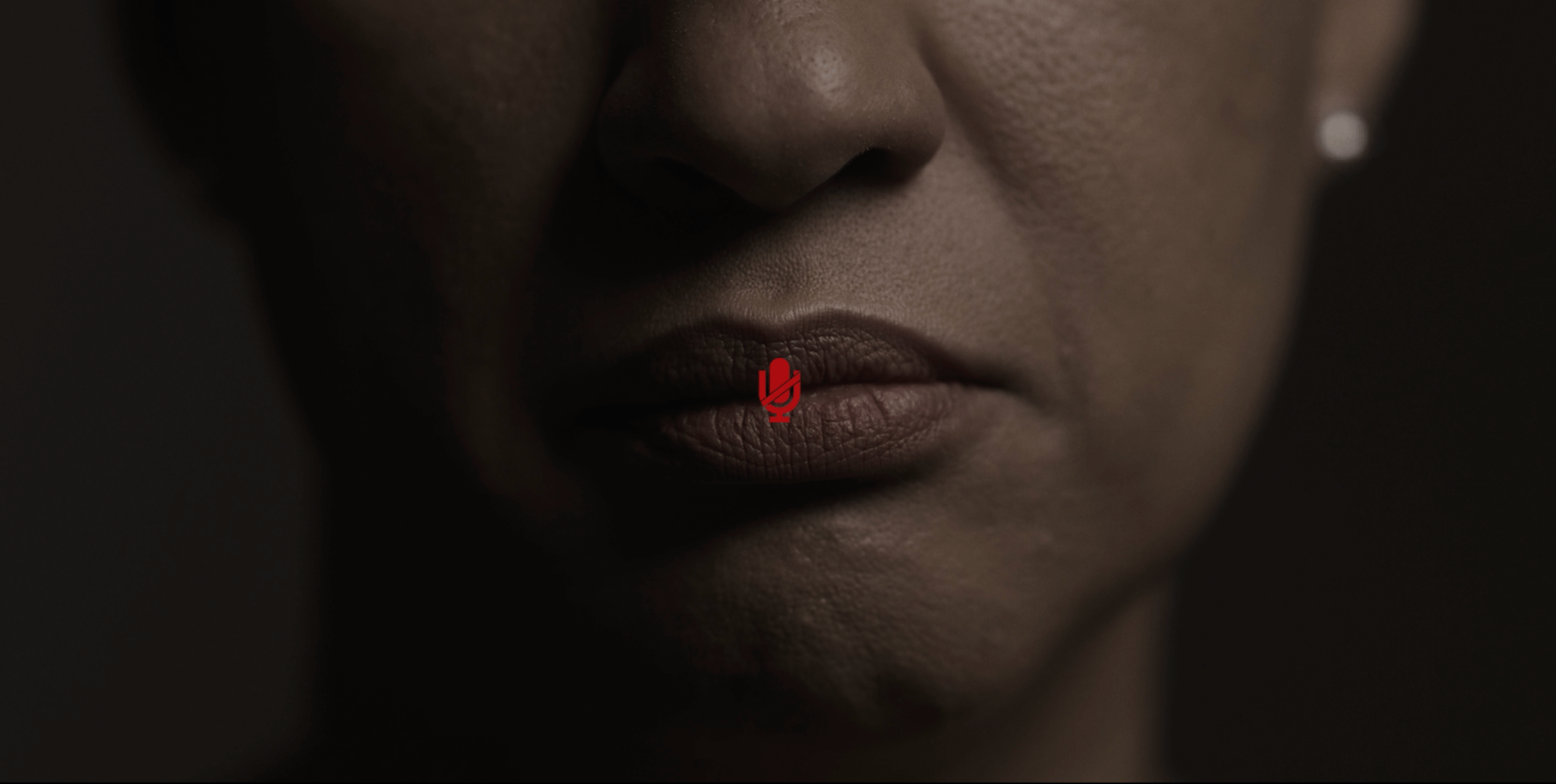 Close up picture of a women with a mute button symbol over her lips
