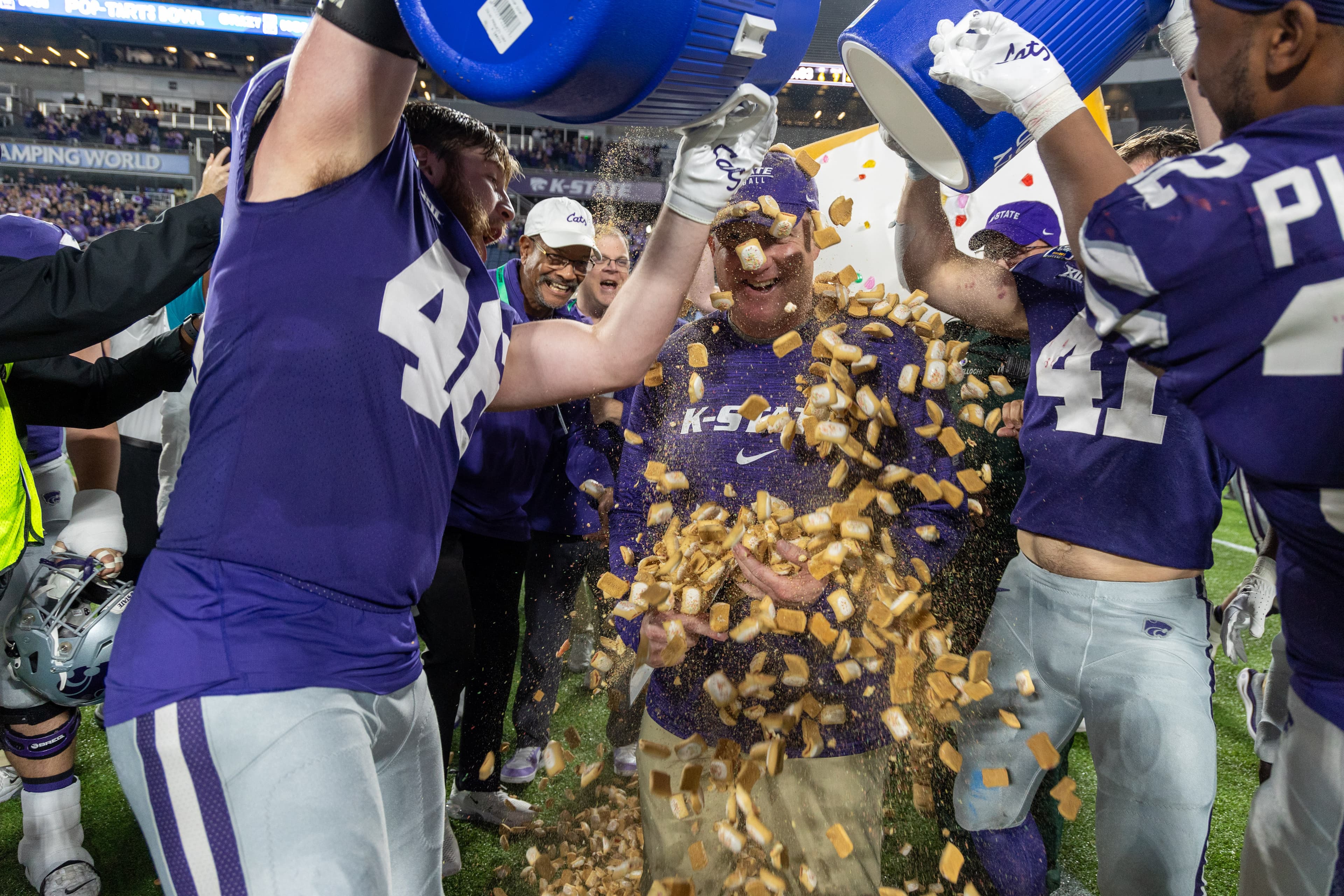 The winning team dumps Pop-Tarts all over their coach at the 2023 Pop-Tarts Bowl