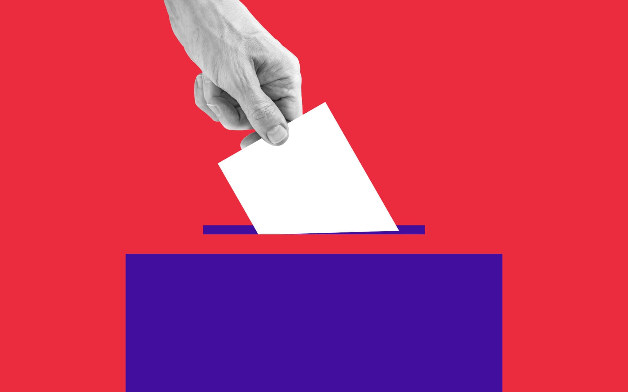 The human hand drops the ballot into the box.