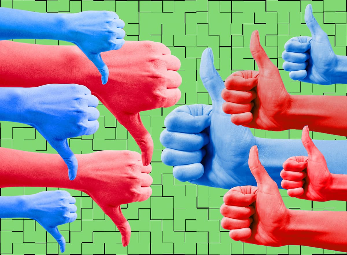 Woman's hand showing 5 red thumbs down and 5 blue thumbs up on illustrated green background