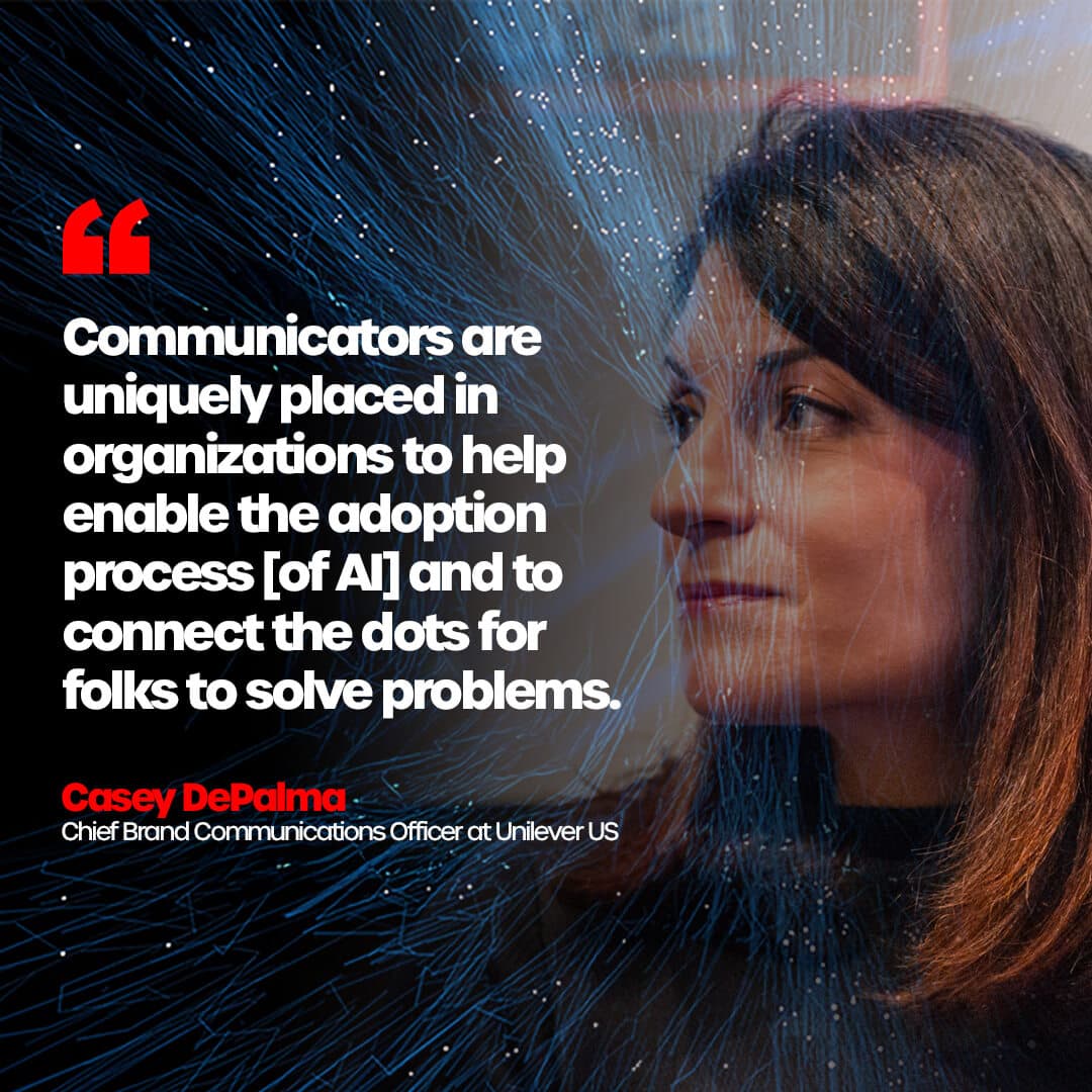 Image of Casey on stage at AI Deciphered. Quote reads: "Communicators are uniquely placed in organizations to help enable the adoption process [of AI] and to connect the dots for folks to solve problems."