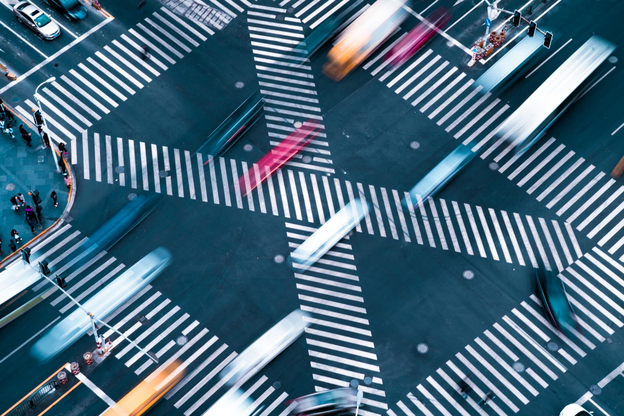 Blur motioin concept.Aerial view car move fast on pedestrian crosswalk in modern city