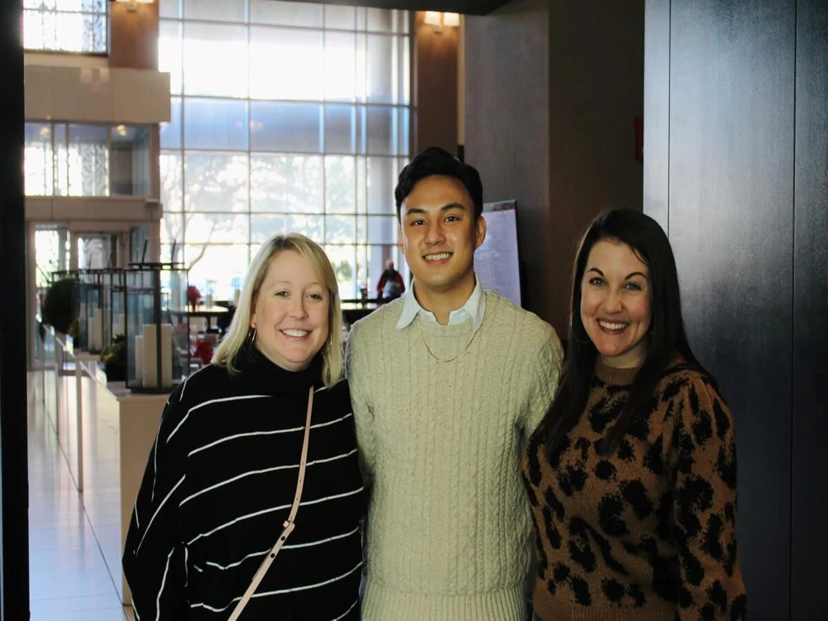 Weber Shandwick team members in Dallas office posing together, highlighting collaborative culture and workplace environment in Texas